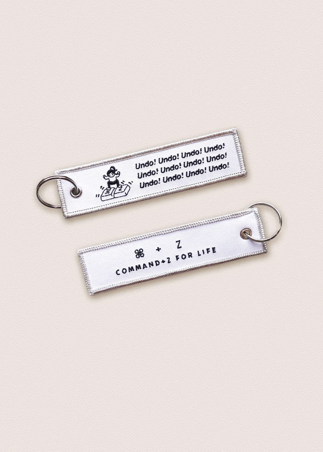 Undo Flight Tag Keychain